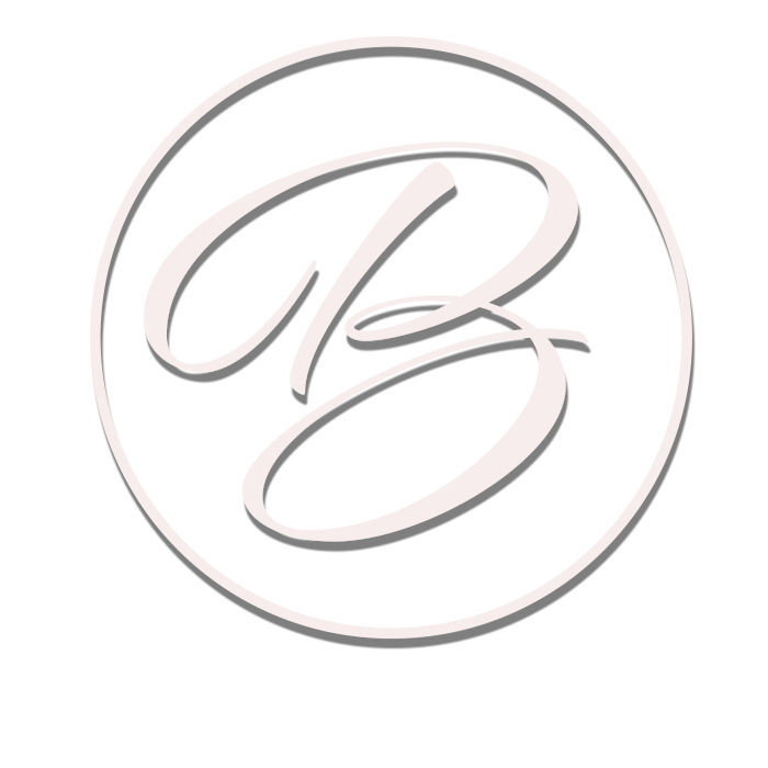 Logo for boutique, cursive b inside circle.